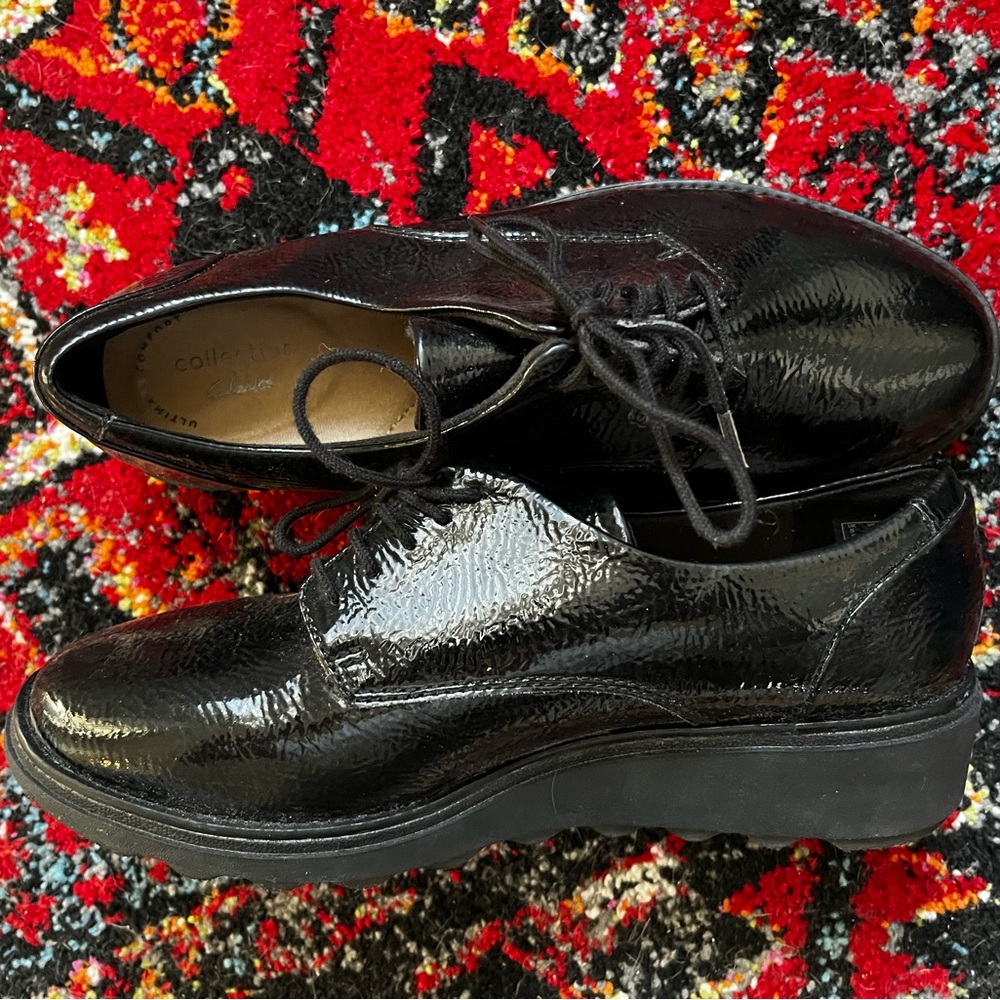 Clarks Oxford Shiny black platform shoes